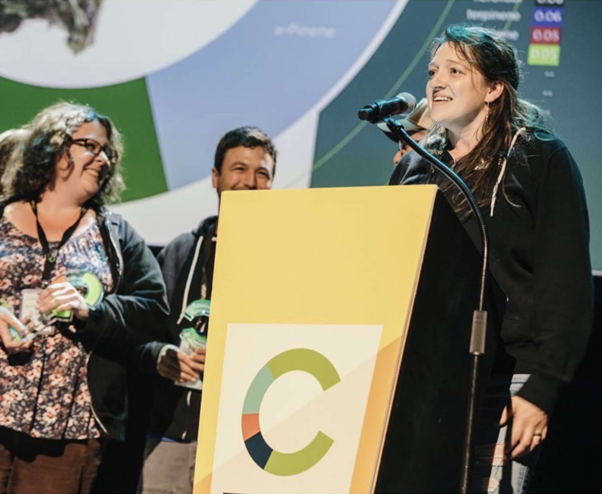 Jodi Haines accepts top prize for Alter Farms at the Oregon cannabis 2019 Cultivation Classic.